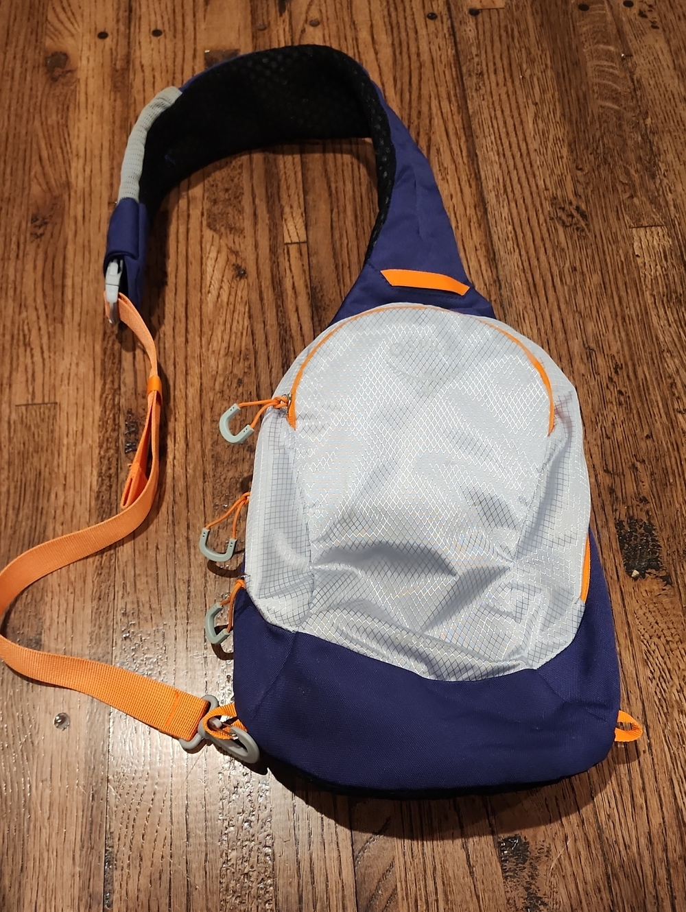 OSPREY Blue and Light Gray Crossbody Sling Bag with Orange Accents